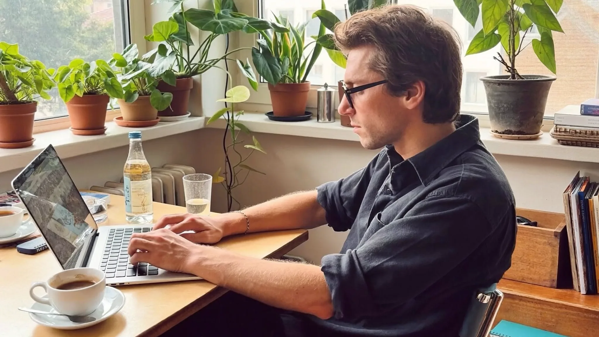 Freelancer working on a laptop in a coworking space